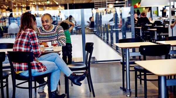 man-and-women-sat-in-an-ikea-restaurant