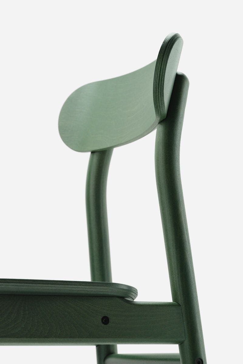 Close-up details of the RÖNNINGE chair's side profile and backrest.