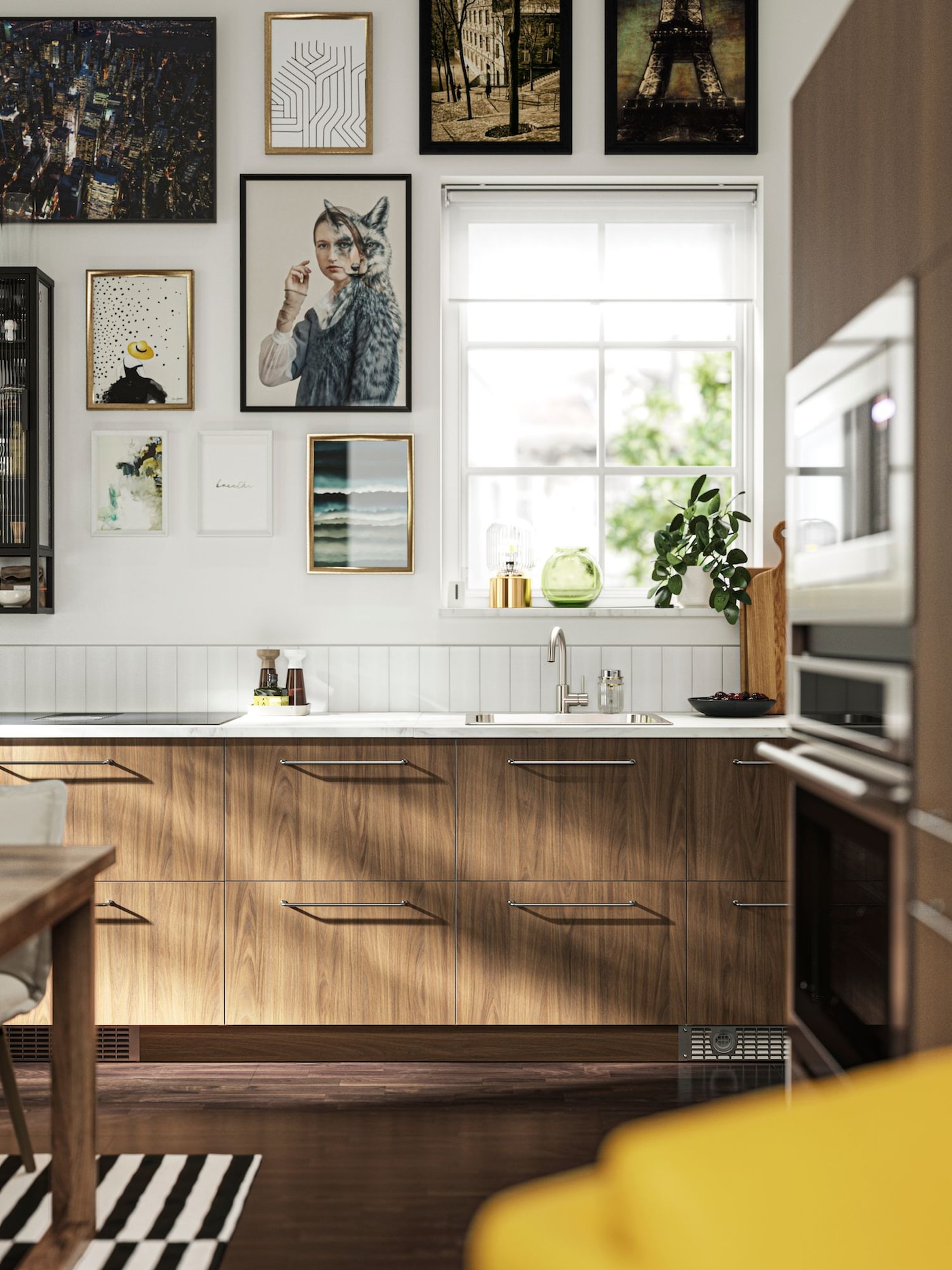 A tidy organised kitchen with dark wood cabinets and white countertop and walls. 